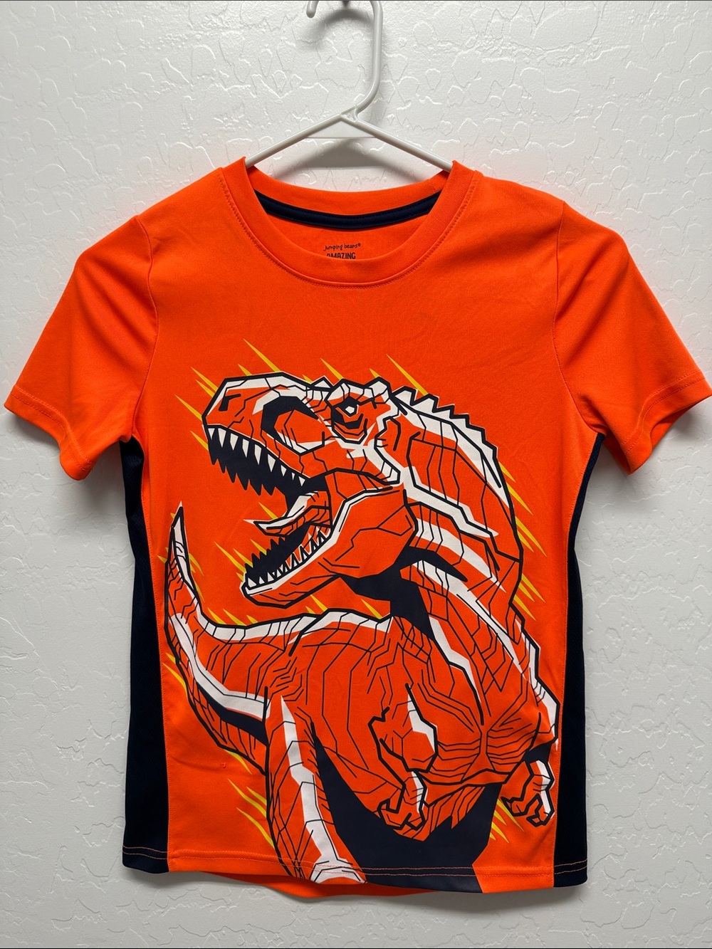 Orange and Black T‑Rex Graphic Short Sleeve Tee